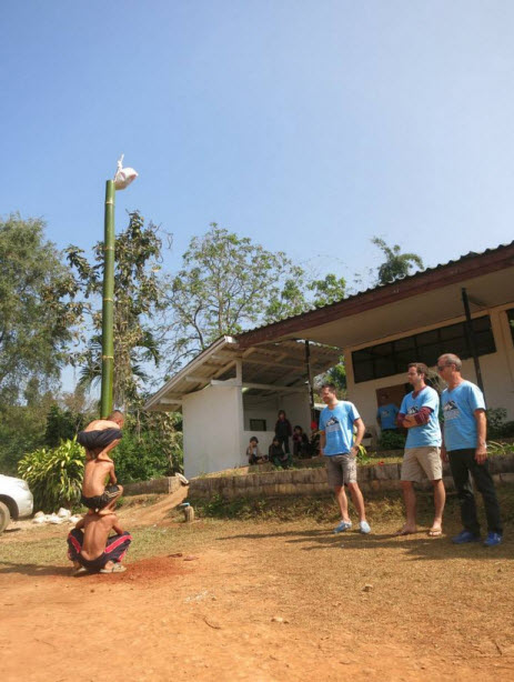 kids climbing the pole