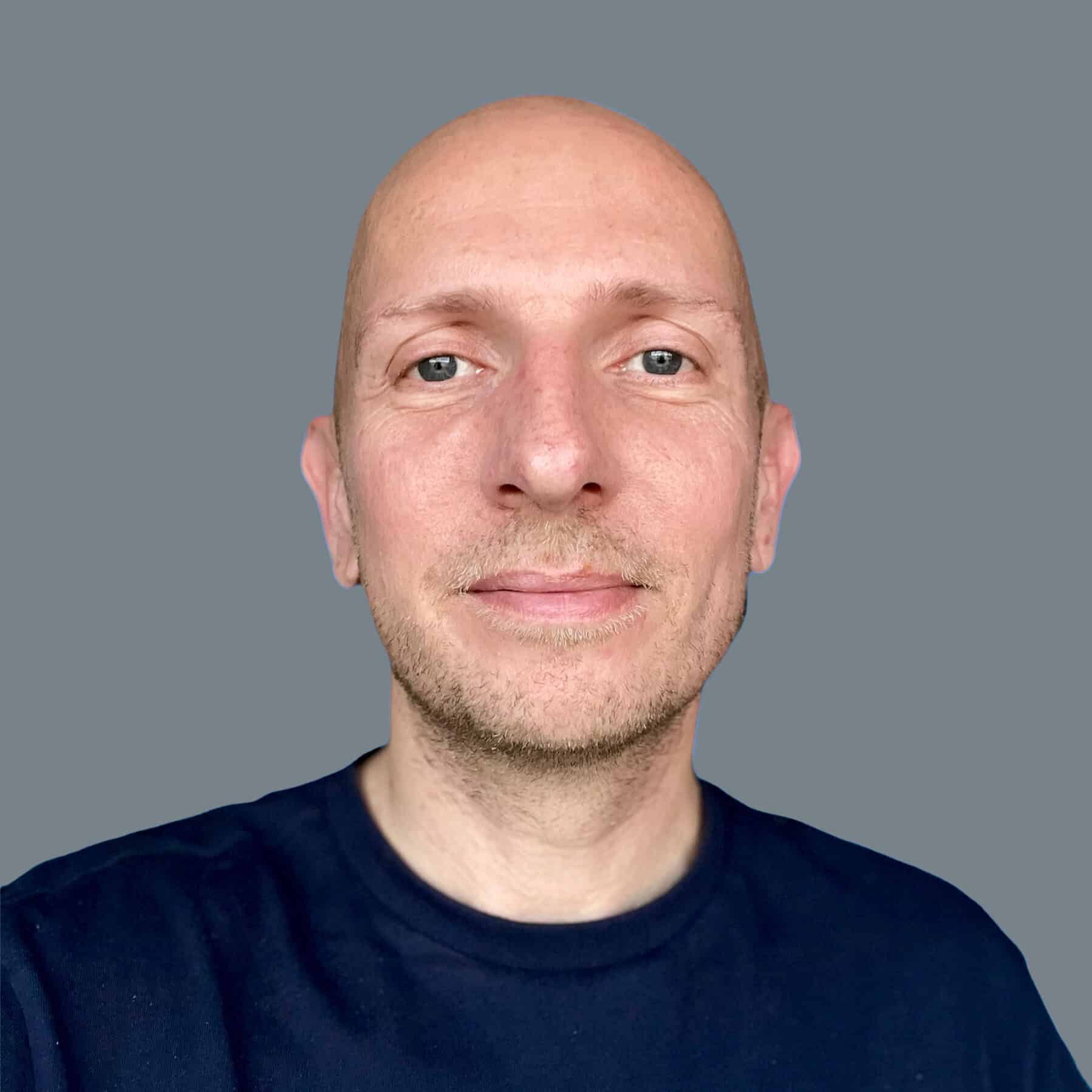 cropped Chris Dark BG.jpg